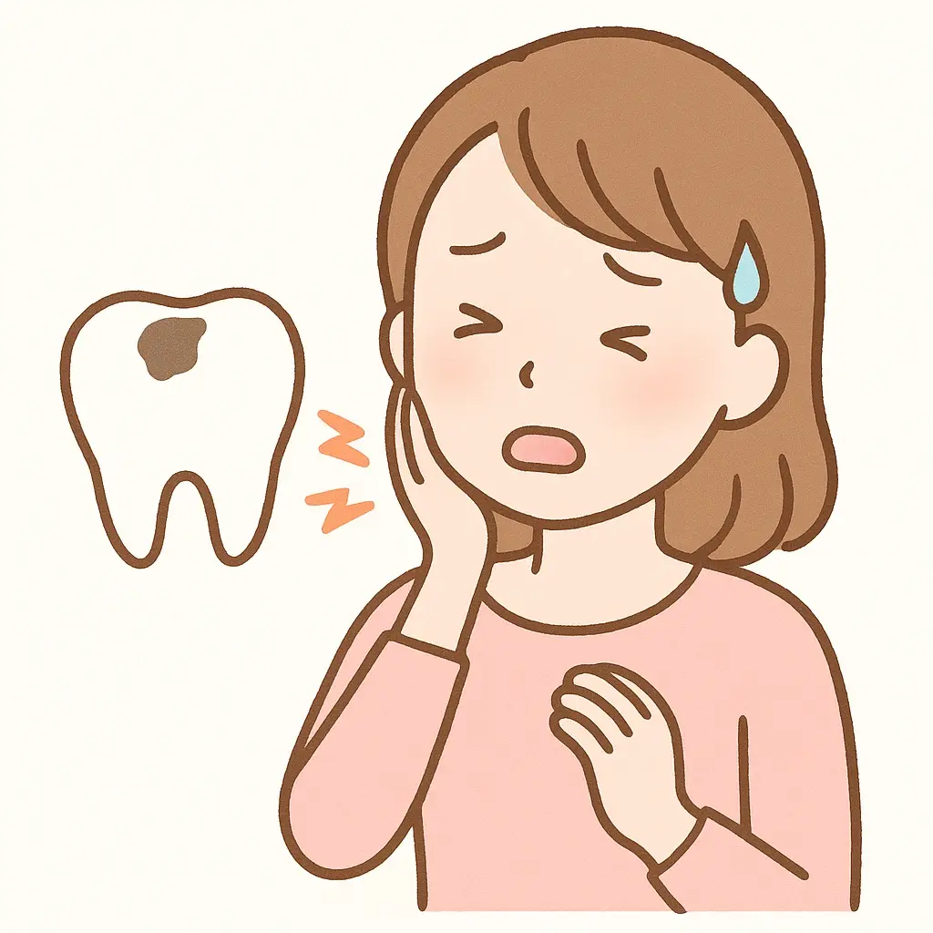 虫歯の痛みに悩む女性の画像